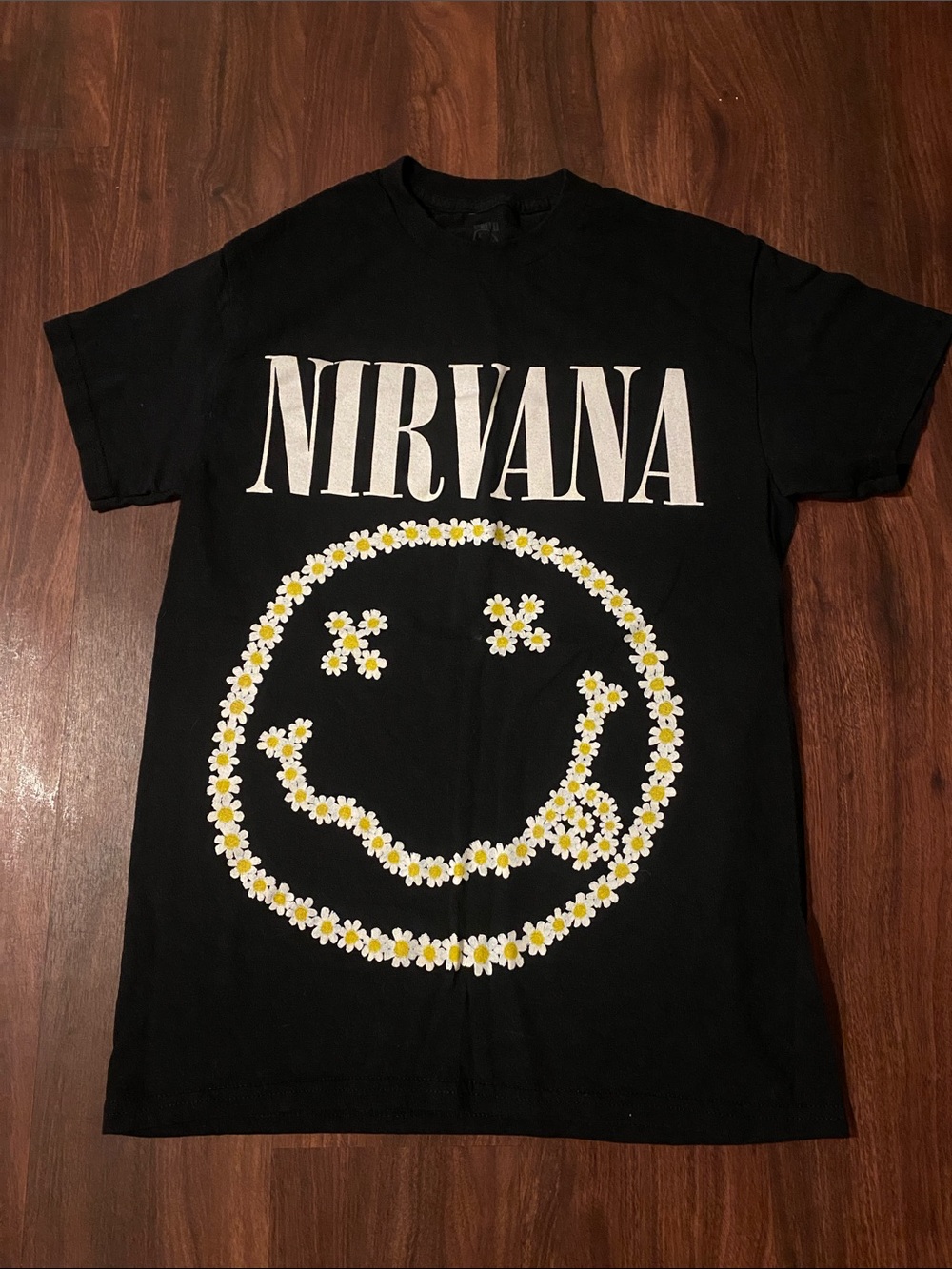 NIRVANA Black Tee with White Logo and Daisy Smile
